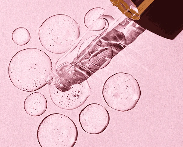 A concentrated drop of PDRN extract highlighting the cellular repair benefits of Salmon DNA