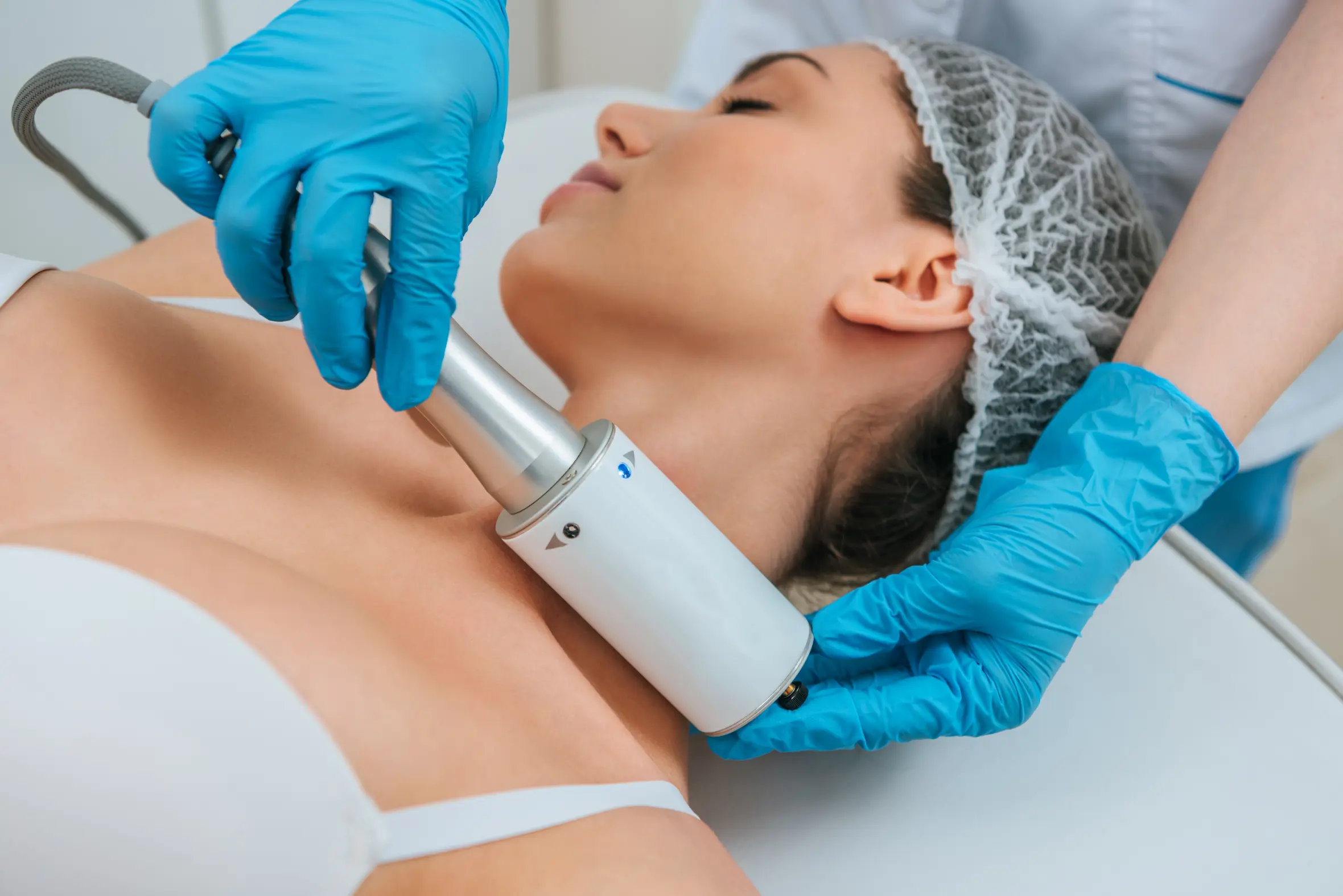 Endospheres Therapy facial handpiece applied during a treatment session