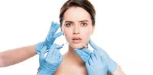 Provider injecting dermal filler near the lips, one of the facial danger zones covered in this guide